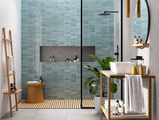 Glossy Sky Blue Subway Tiles tiled as a Feature wall inside the bathroom.